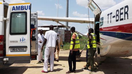 moving patient into the ambulance